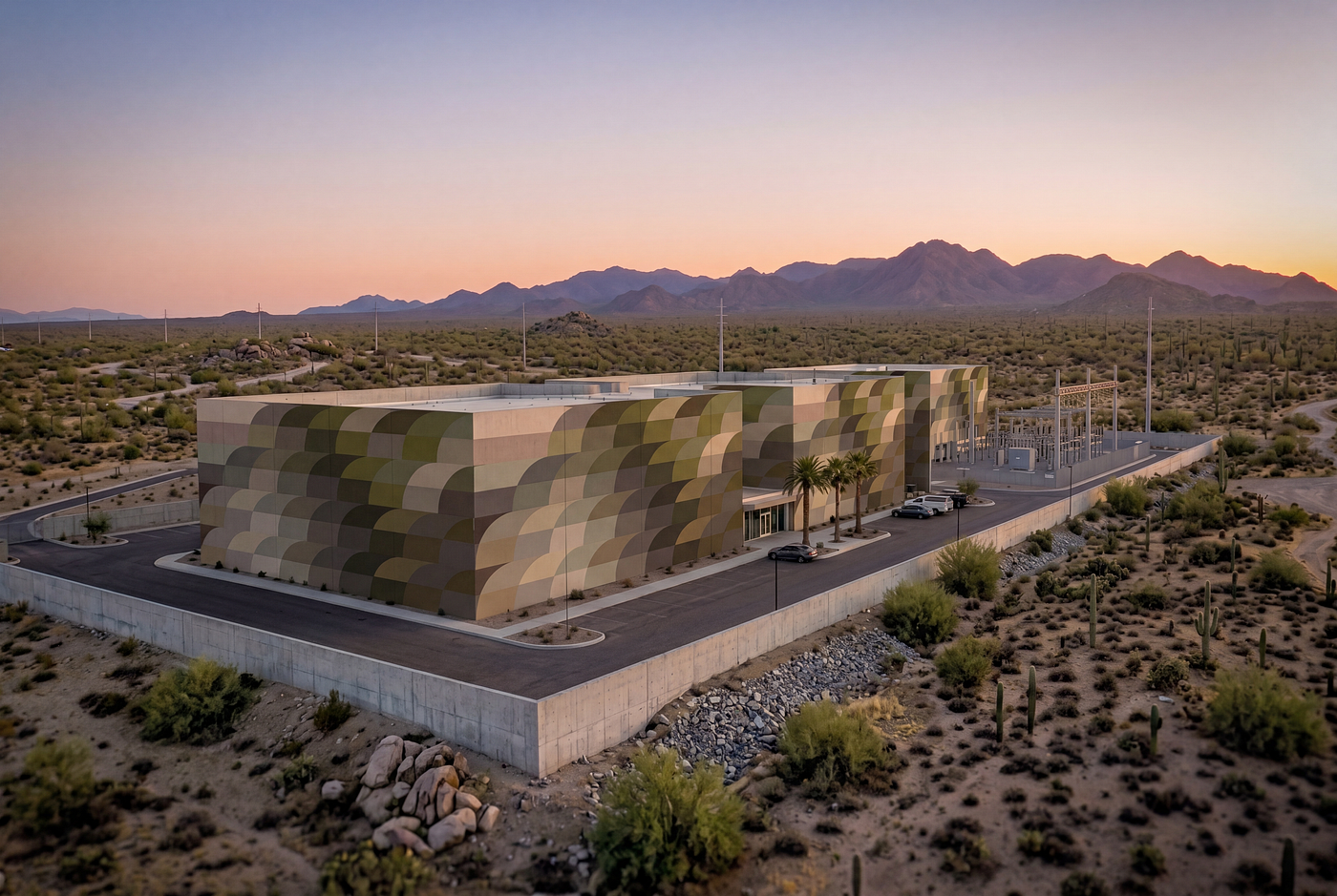 Large-scale geometric pattern applied to an industrial building facade.